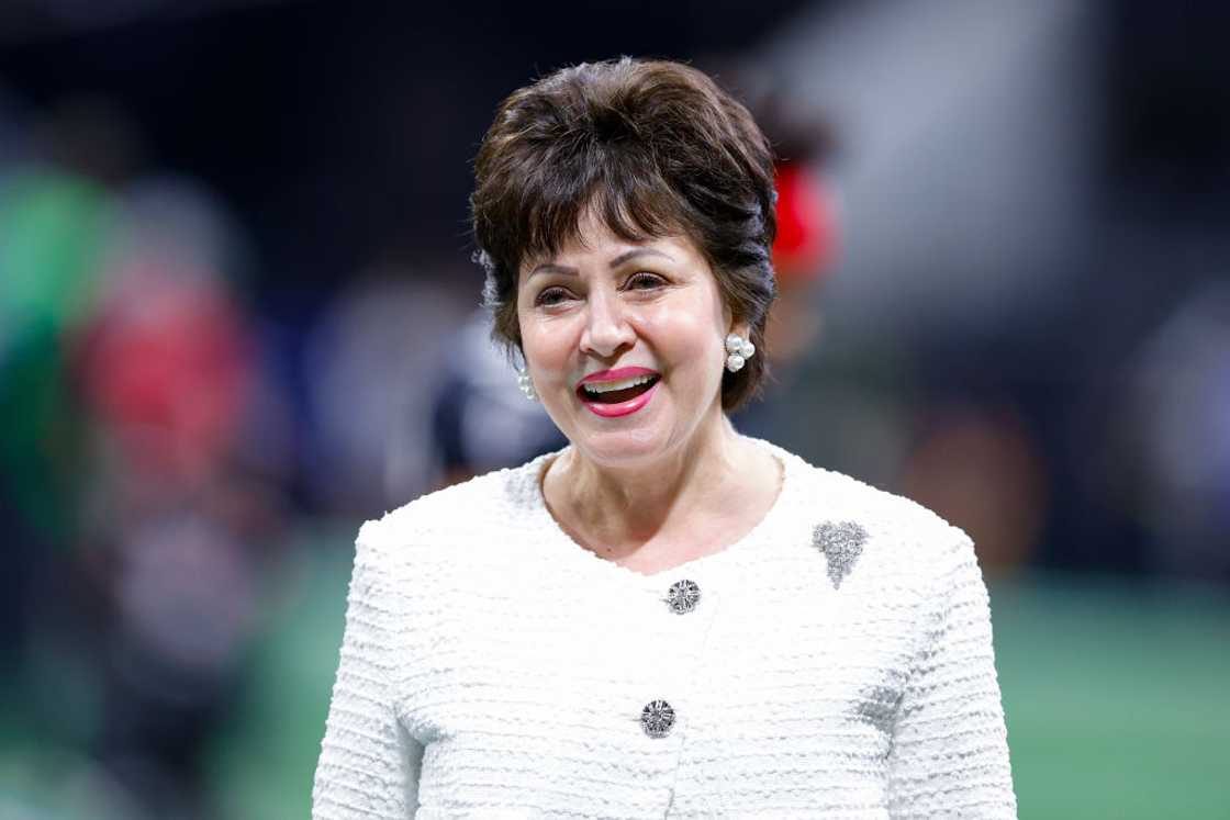 Gayle Benson comes onto the field before the game begins