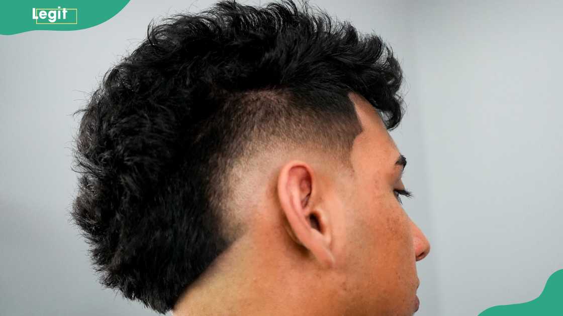 Frohawk with shadow fade hairstyle for men Frohawk with shadow fade hairstyle for men