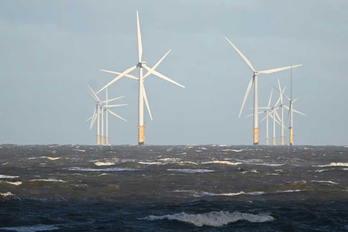 Turbines like these off the coast of Wales are expected to help wind power become Britain's largest source of electricity in 2025