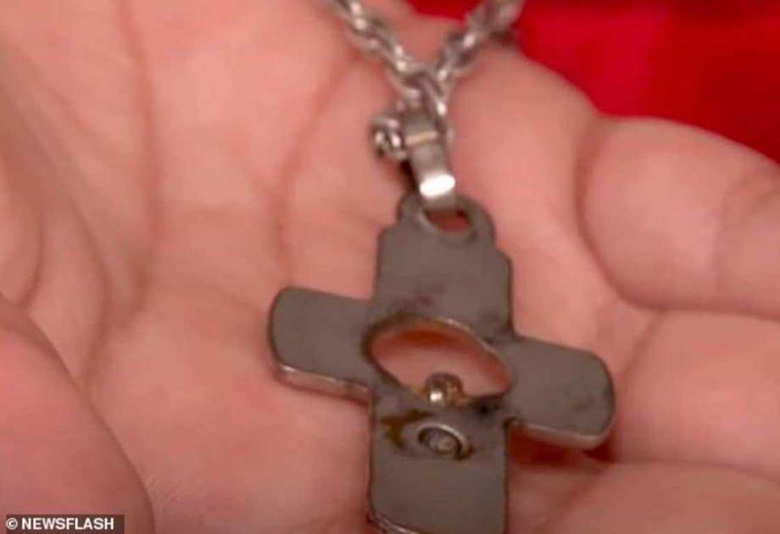 9-year-old boy's life saved by crucifix necklace that stopped stray bullet penetrating his chest 9-year-old boy's life saved by crucifix necklace that stopped stray bullet penetrating his chest