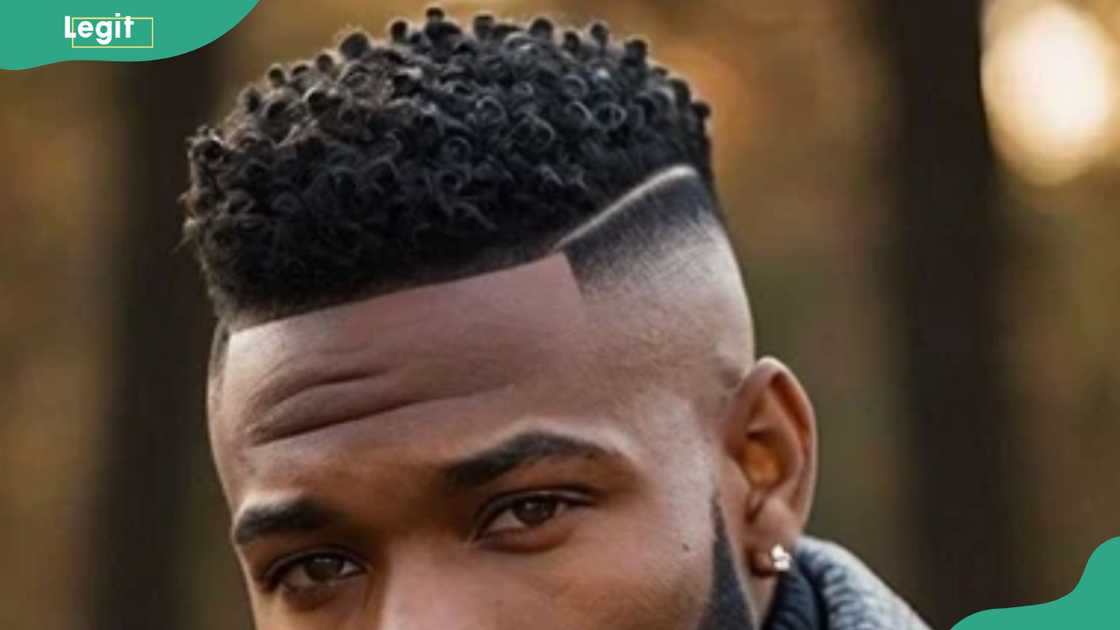 High top fade with mid taper hairstyle High top fade with mid taper hairstyle