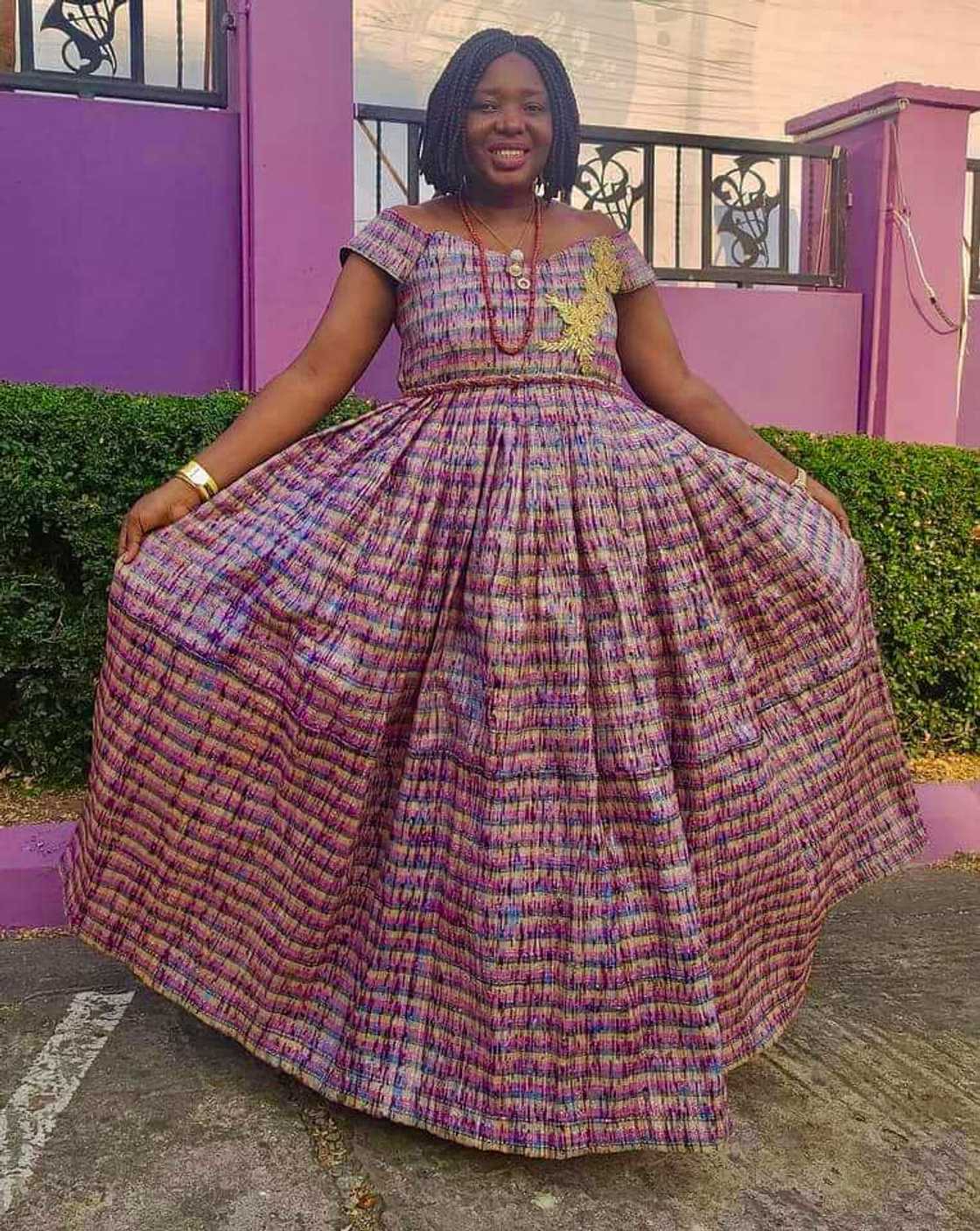 Creative woman turns pure water sachets into dress.