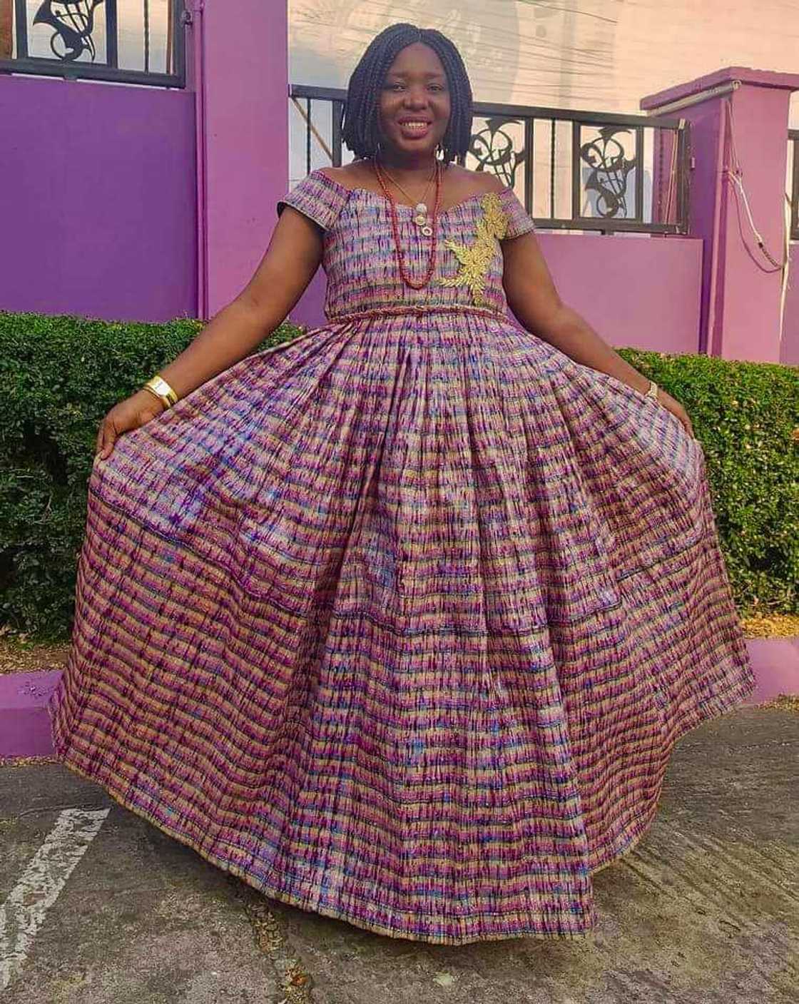 Creative woman turns pure water sachets into dress. Creative woman turns pure water sachets into dress.