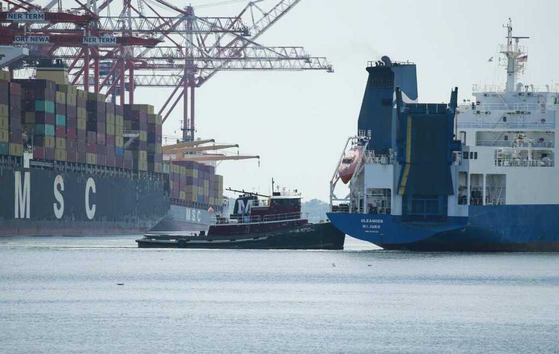 A ship departs from the Port Newark container terminal in Newark, New Jersey on July 21, 2022