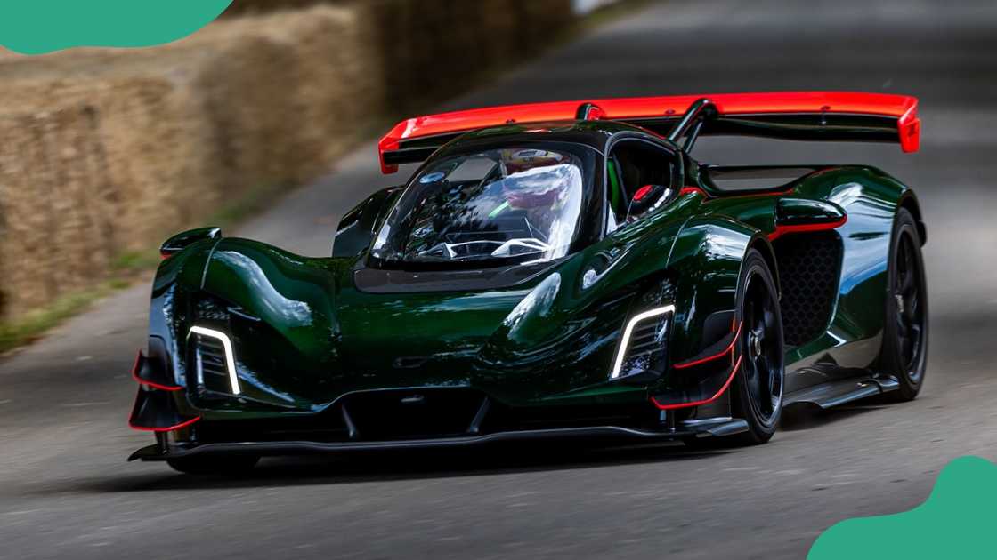 The Rattlesnake Green variant of the Czinger 21C VMax pictured racing. The Rattlesnake Green variant of the Czinger 21C VMax pictured racing.