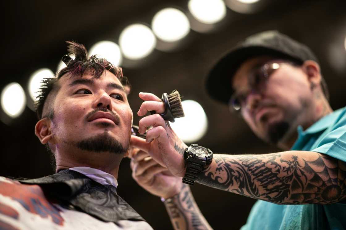 Popular culture in Japan driven by boy-band idols and young male actors steers men towards longer coiffures instead of barber styles Popular culture in Japan driven by boy-band idols and young male actors steers men towards longer coiffures instead of barber styles