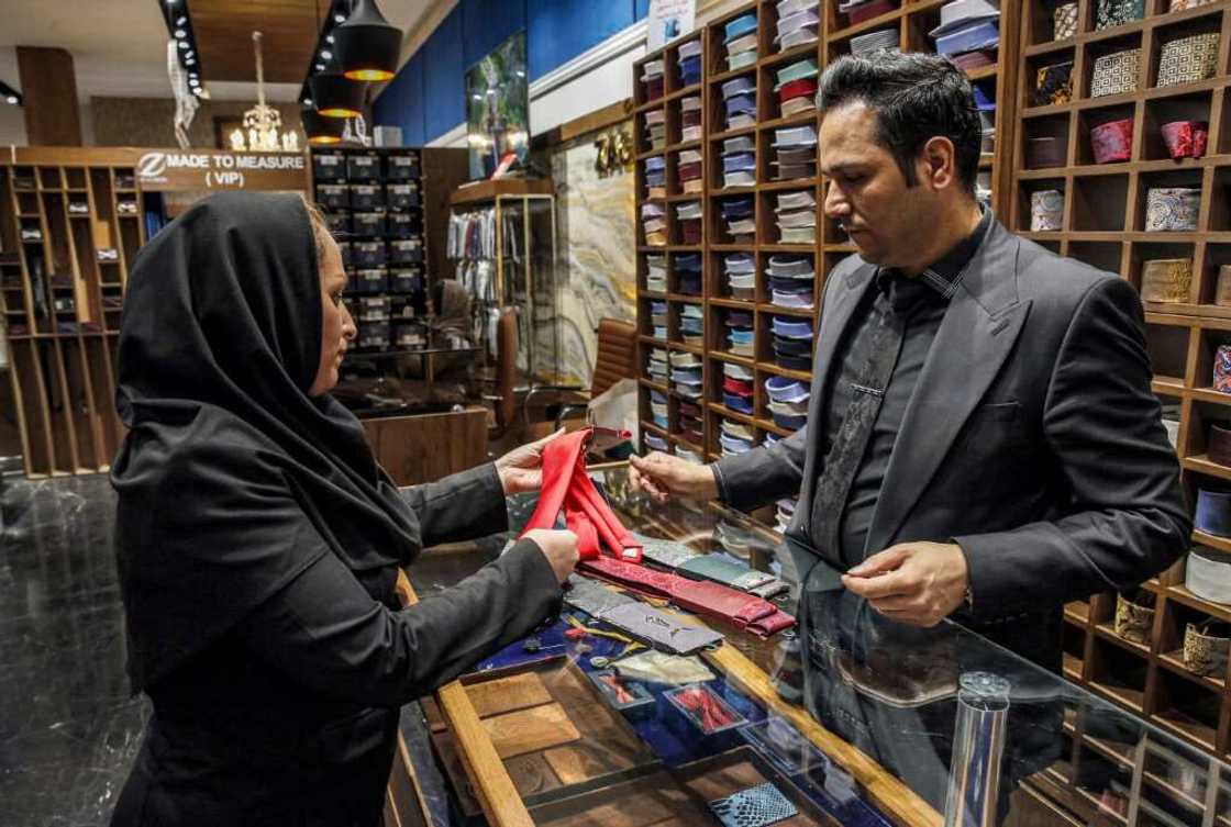 Neckties have become popular gifts for well-to-do families in Tehran as official attitudes have relaxed