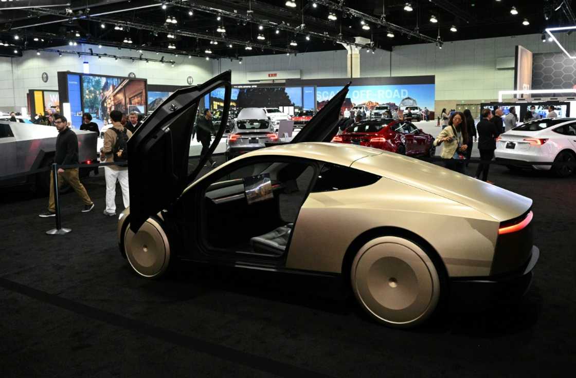 Tesla's Cybercab robotaxi -- displayed during the AutoMobility LA 2024 auto show in 2024 -- is not expected to go into production until 2026 Tesla's Cybercab robotaxi -- displayed during the AutoMobility LA 2024 auto show in 2024 -- is not expected to go into production until 2026