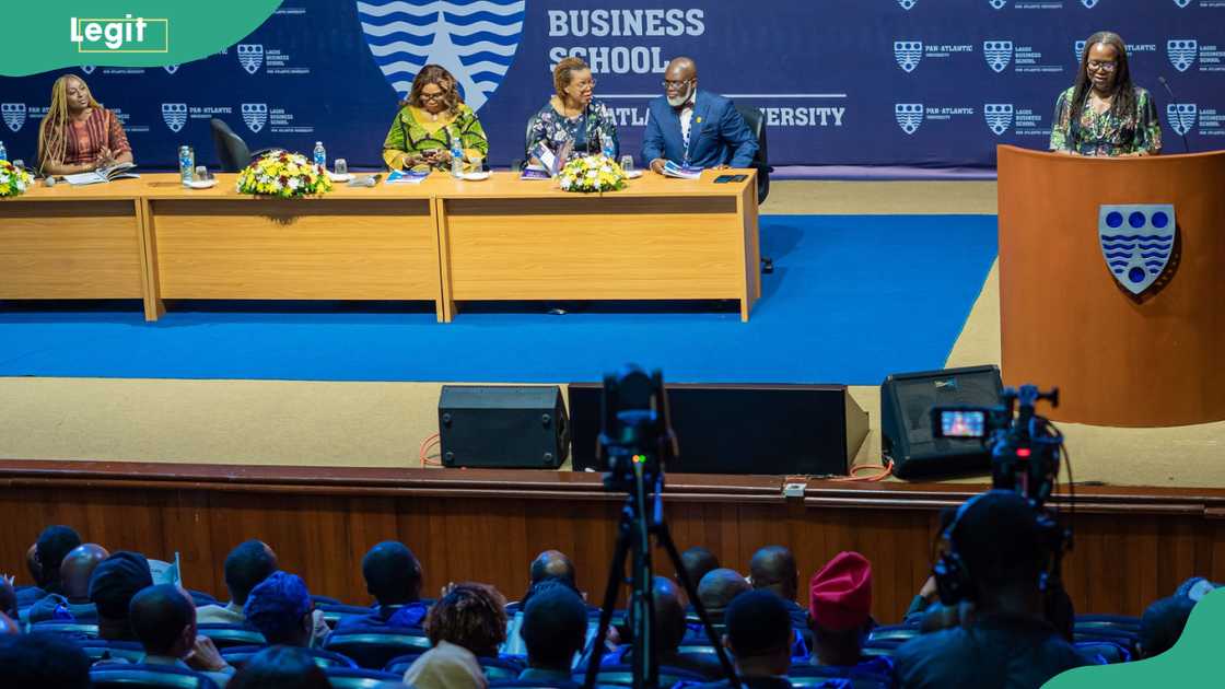Guests discuss during an event at Lagos Business School
