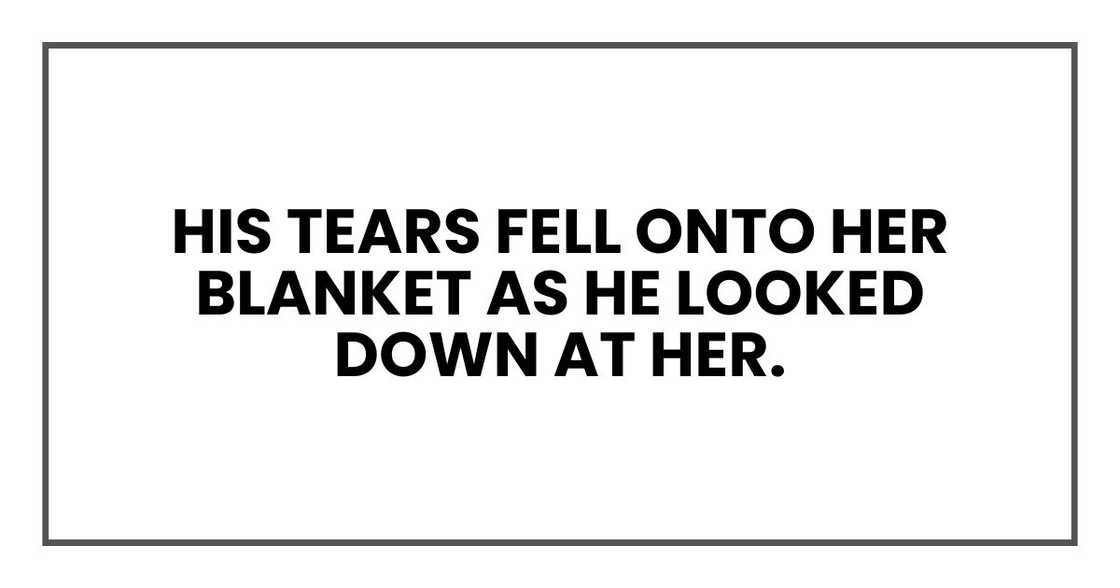His tears fell onto her blanket as he looked down at her.