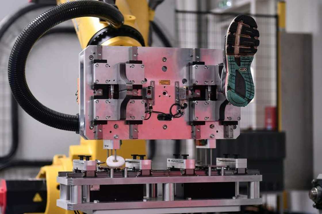 Simple tasks like separating soles from shoes are only just being mechanised Simple tasks like separating soles from shoes are only just being mechanised
