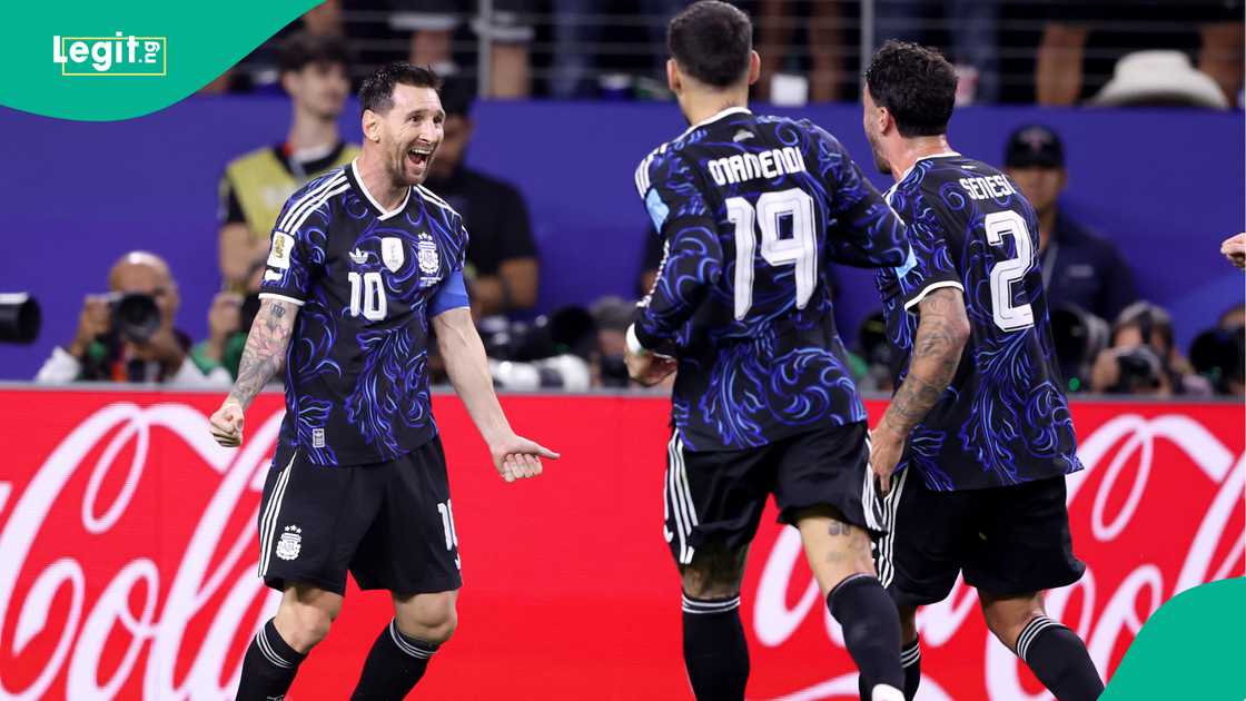 Lionel Messi celebrates scoring Argentina's third goal against Jordan. Photo by Rico Brouwer