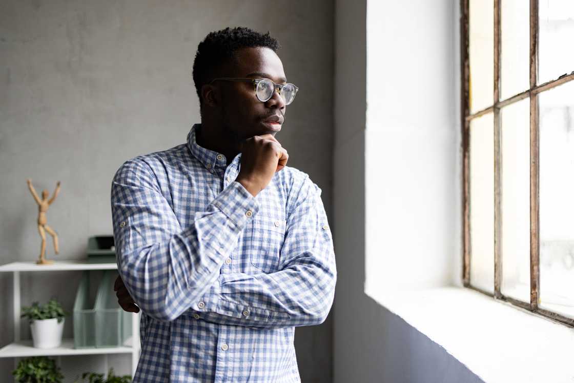 A businessman reflecting on his life A businessman reflecting on his life