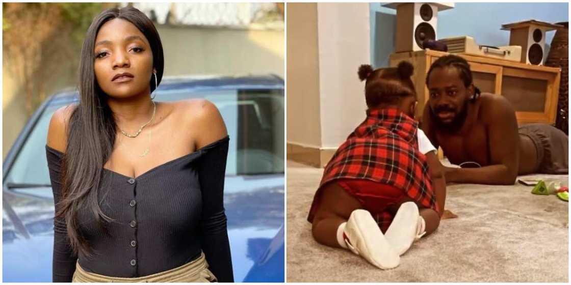 Fans in awe as of Simi and Adekunle Gold's daughter crawls, poses for photo in new video Fans in awe as of Simi and Adekunle Gold's daughter crawls, poses for photo in new video