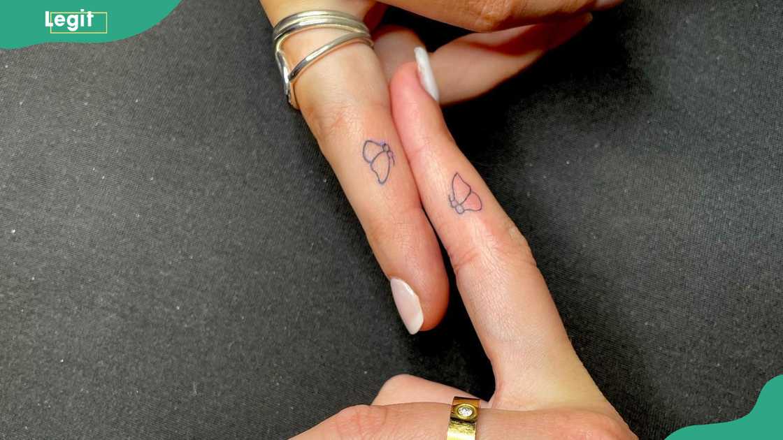 Butterfly wedding ring tattoos