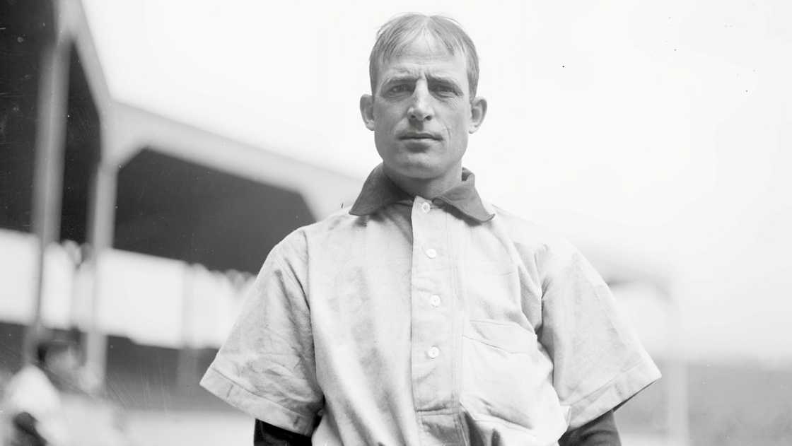 Fred C. Clarke of the Pittsburgh Pirates poses facing the camera while standing on the West Side Grounds in Chicago.