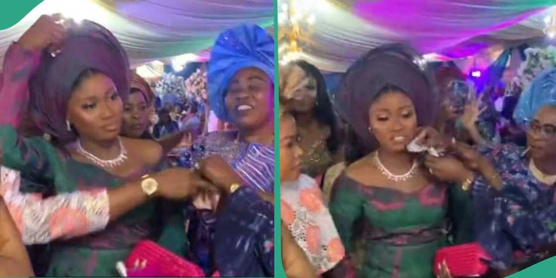 Confusion as bride's sister stops woman from spraying money on her Confusion as bride's sister stops woman from spraying money on her