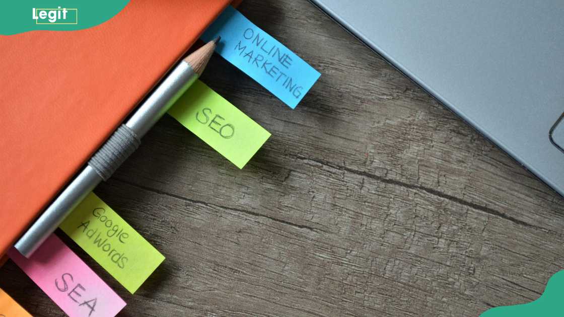 A close-up of sticky notes and a pencil on Notebook