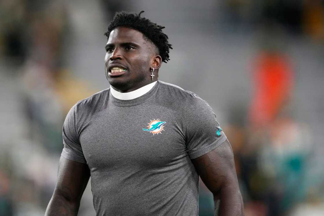 Tyreek Hill of the Miami Dolphins warms up before a game