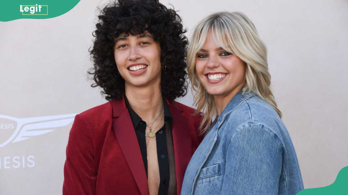 Towa Bird and Reneé Rapp smiling together at an event. Towa Bird and Reneé Rapp smiling together at an event.