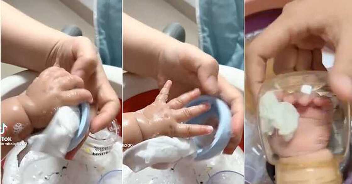 Mum makes baby wash plates, dishes Mum makes baby wash plates, dishes