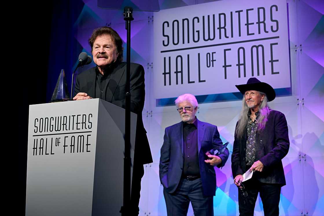 Tom Johnston of The Doobie Brothers speak onstage Tom Johnston of The Doobie Brothers speak onstage