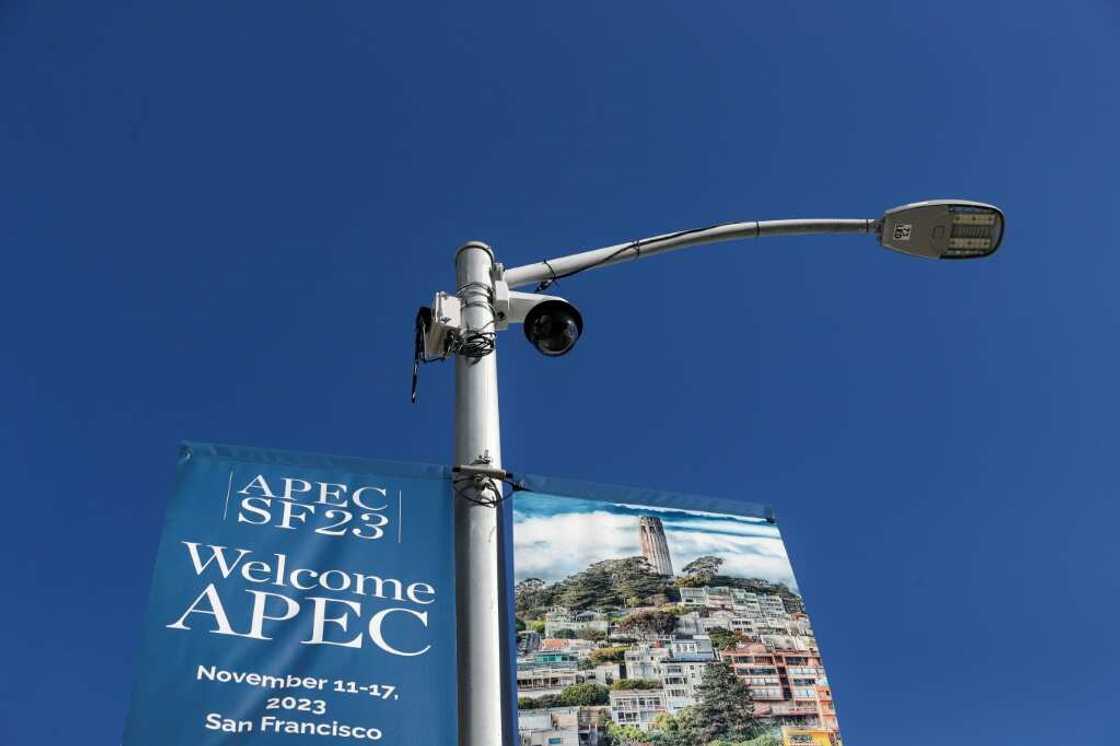 A security camera is seen by a sign announcing the Asia-Pacific Economic Cooperation (APEC) summit as security preparations get under way in San Francisco, California A security camera is seen by a sign announcing the Asia-Pacific Economic Cooperation (APEC) summit as security preparations get under way in San Francisco, California