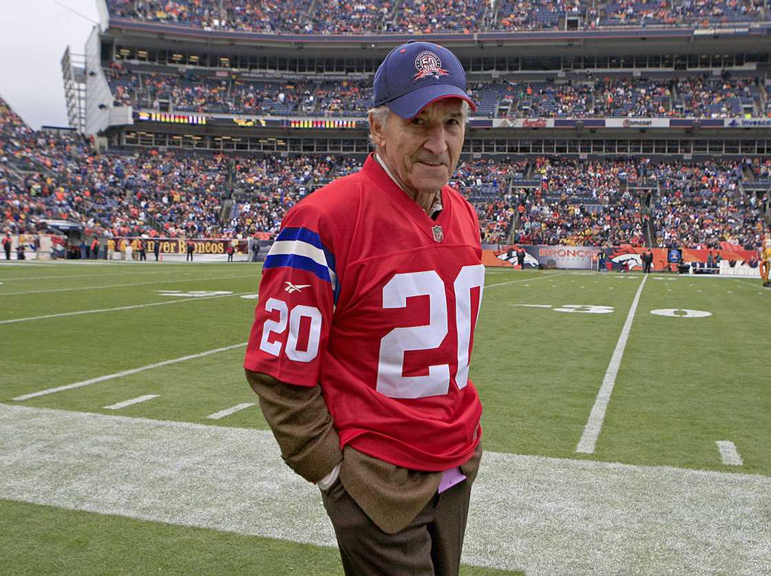 Gino Cappelletti in his jersey No. 20 stands on the sidelines of the football pitch Gino Cappelletti in his jersey No. 20 stands on the sidelines of the football pitch