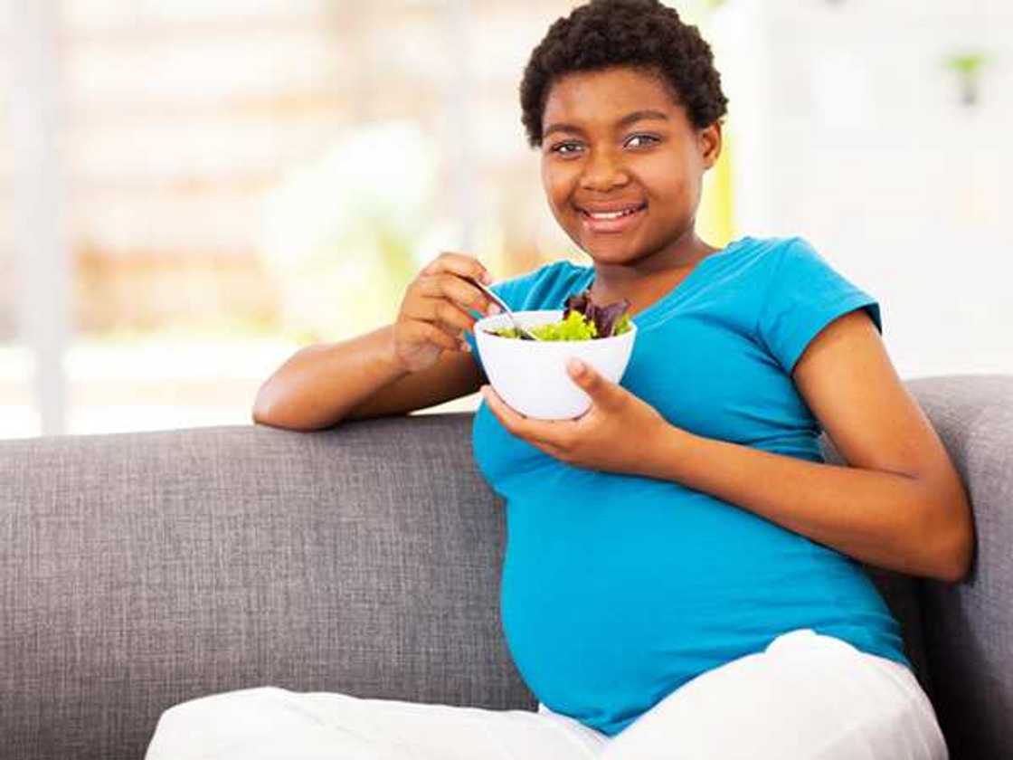 Pregnant woman eating Pregnant woman eating