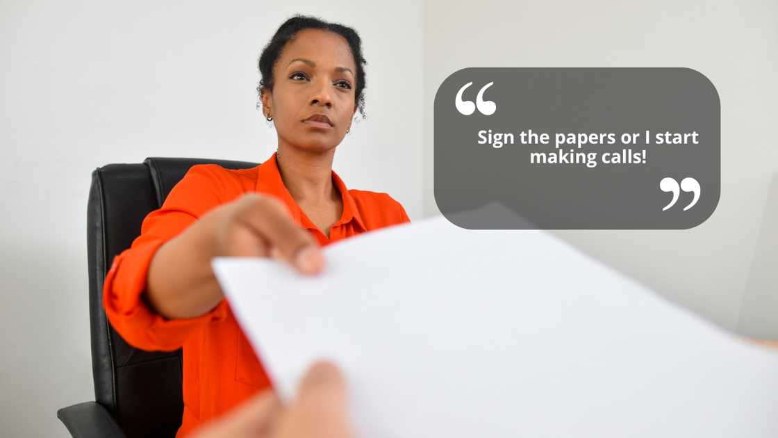 A sad woman receiving papers A sad woman receiving papers