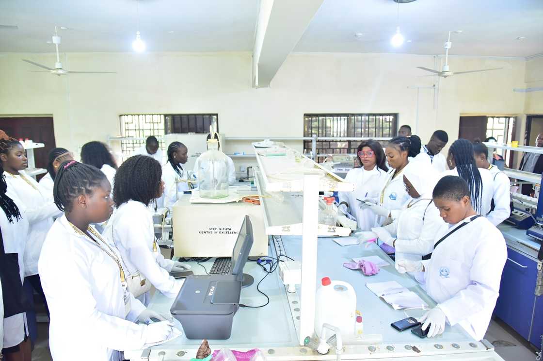 A group of students in a laboratory A group of students in a laboratory