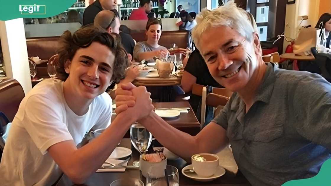 Timothée Chalamet and his father at a restaurant Timothée Chalamet and his father at a restaurant