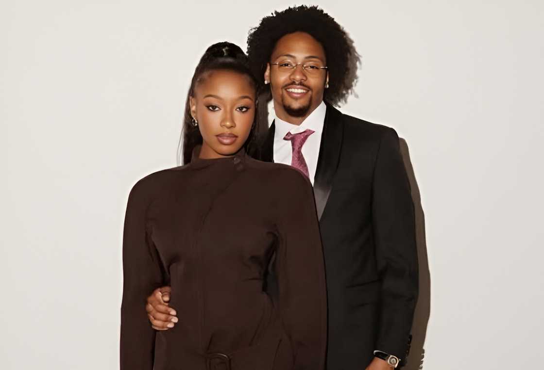 Kordell Beckham and Serena Page pose against a grey background