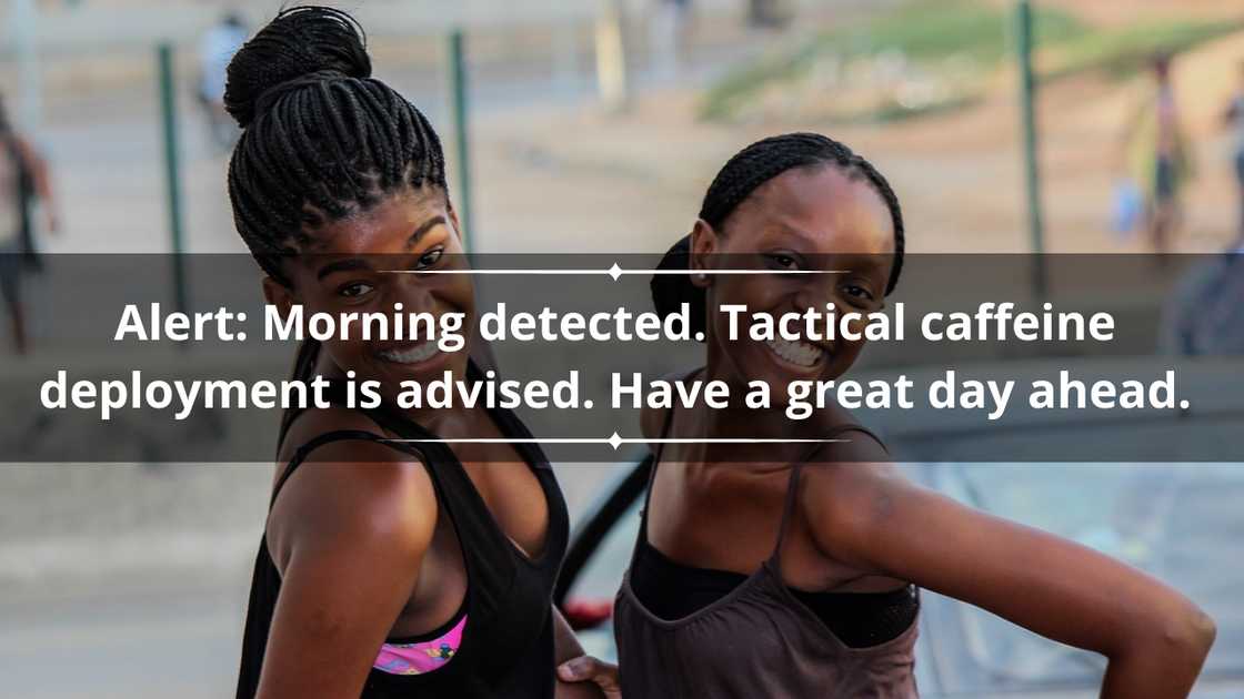 Two young female friends are smiling as they pose for a picture