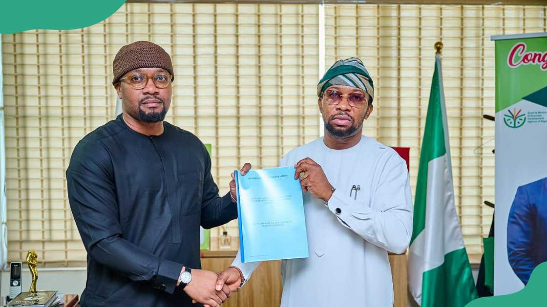 Nigerian MSMEs entrepreneur receiving a SMEDAN certificate.