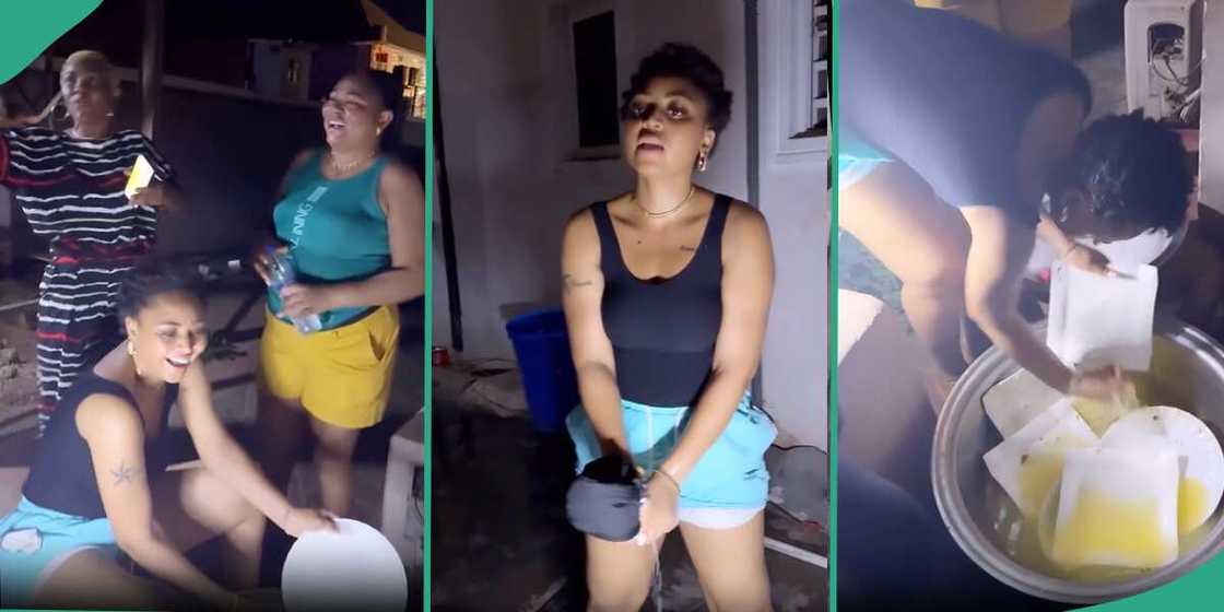 Regina Daniels' mother makes her wash plates, clothes, with her hand in viral video. Regina Daniels' mother makes her wash plates, clothes, with her hand in viral video.