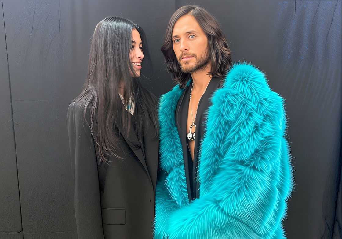 Thet Thinn, poses with the singer at the Gucci Love Parade fashion show