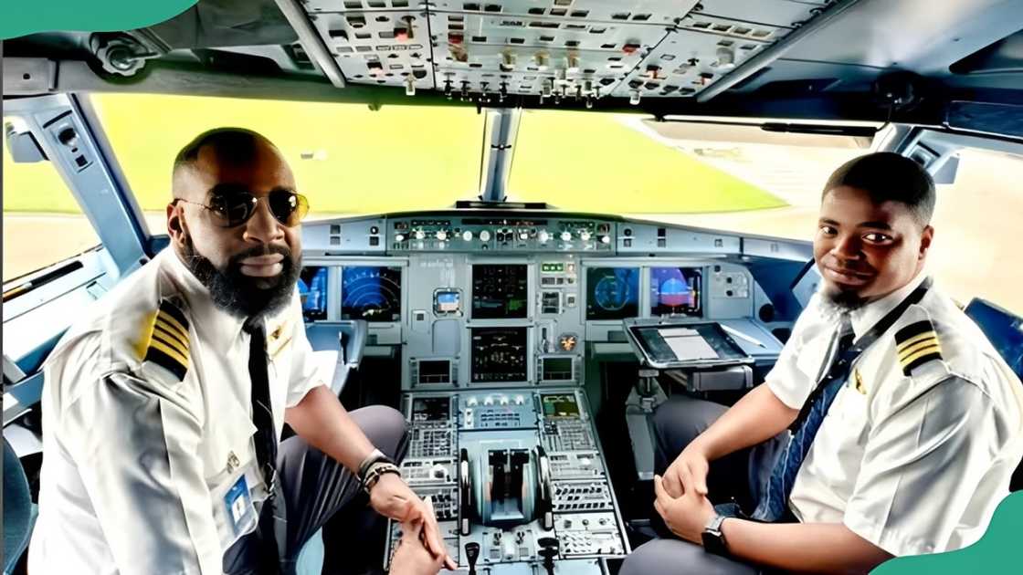 Two pilots sit in a plane's cockpit Two pilots sit in a plane's cockpit