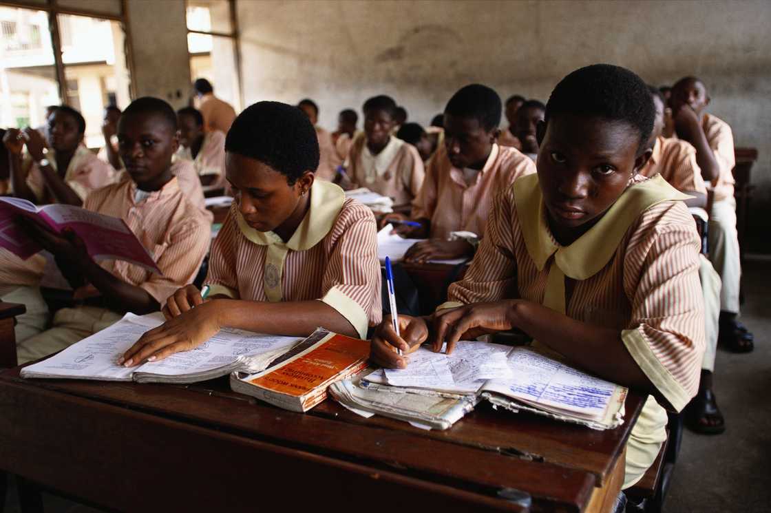 Nigerian students study during class at their Lagos school