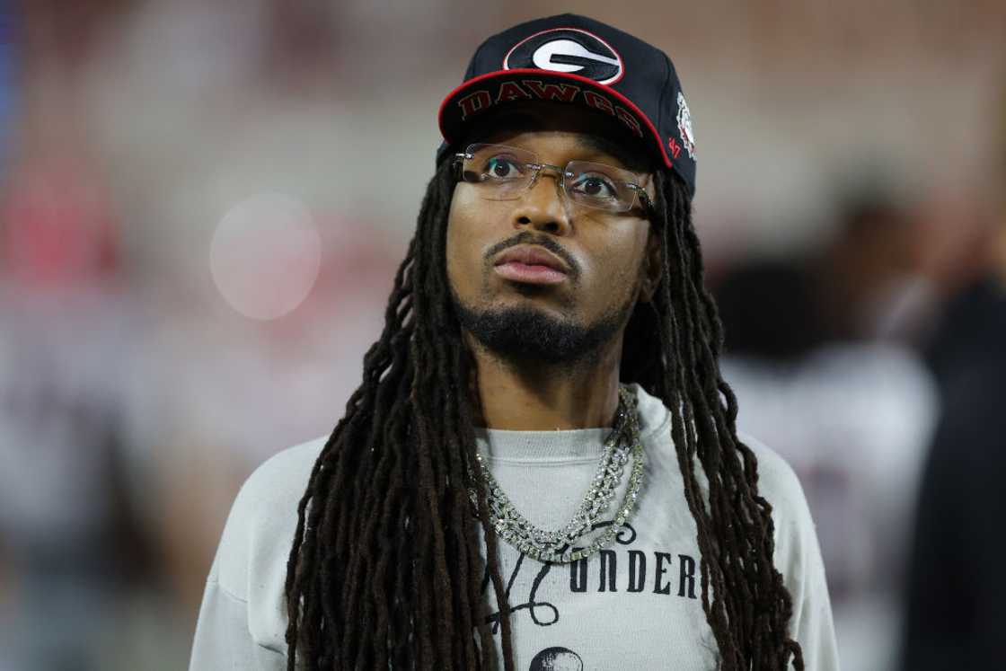 Quavo at the game between the Alabama Crimson Tide and the Georgia Bulldogs Quavo at the game between the Alabama Crimson Tide and the Georgia Bulldogs