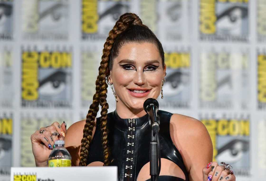 Kesha speaks onstage at the Discovery+ "Conjuring Kesha" panel Kesha speaks onstage at the Discovery+ "Conjuring Kesha" panel