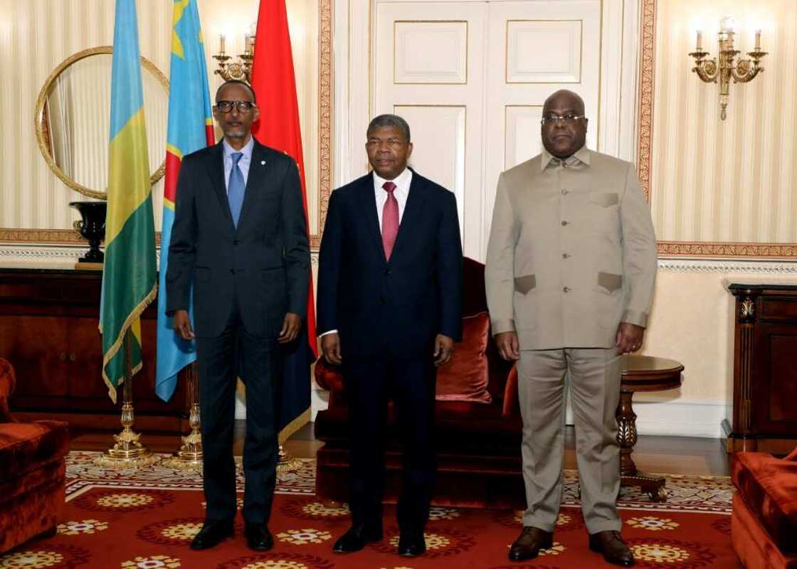 Rwanda President Paul Kagame (L), Angola President Joao Lourenco (C) and Democratic Republic of Congo President Felix Tshisekedi (R) met for talks in Luanda on July 6, 2022, after a surge in violence in eastern DRC Rwanda President Paul Kagame (L), Angola President Joao Lourenco (C) and Democratic Republic of Congo President Felix Tshisekedi (R) met for talks in Luanda on July 6, 2022, after a surge in violence in eastern DRC