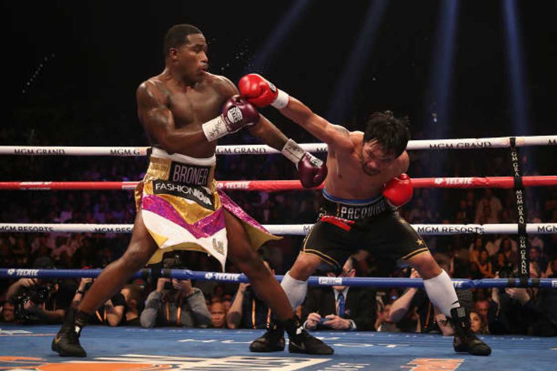 Manny Pacquiao throws a right on Adrien Broner during the WBA welterweight championship at MGM Grand Garden Arena. Manny Pacquiao throws a right on Adrien Broner during the WBA welterweight championship at MGM Grand Garden Arena.