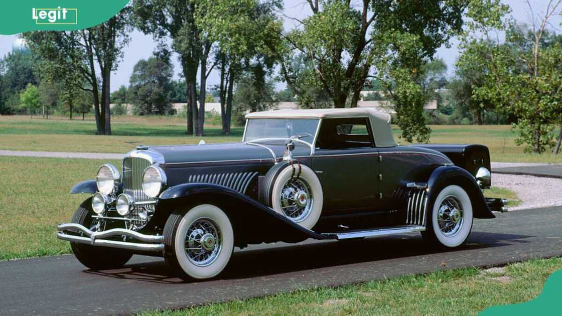 1929 Duesenberg J. in a beautiful field 1929 Duesenberg J. in a beautiful field