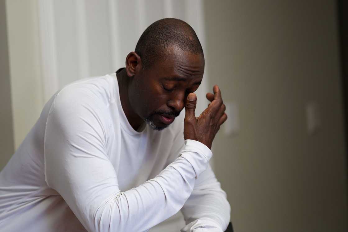 A man weeping A man weeping