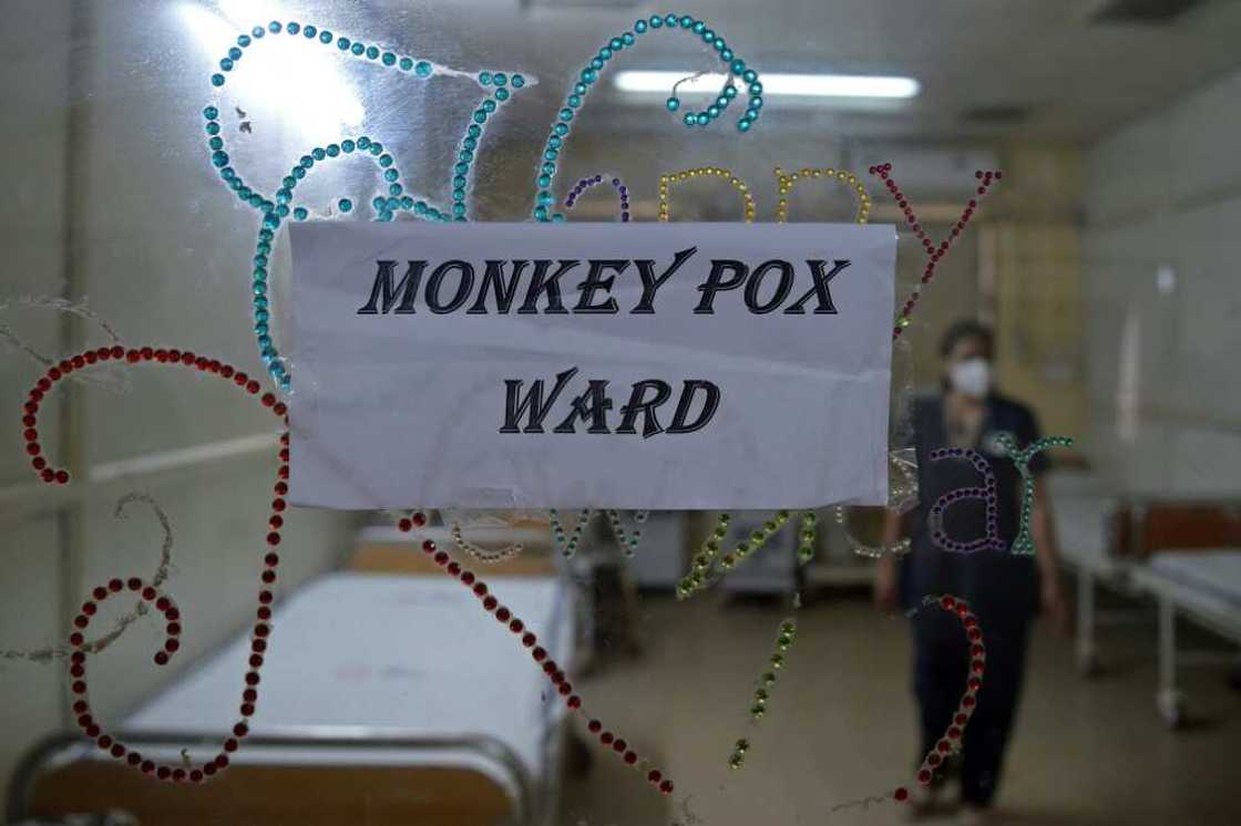 A health worker walks inside an isolation ward built as a precautionary measure for monkeypox patients at a civil hospital in Ahmedabad, India A health worker walks inside an isolation ward built as a precautionary measure for monkeypox patients at a civil hospital in Ahmedabad, India