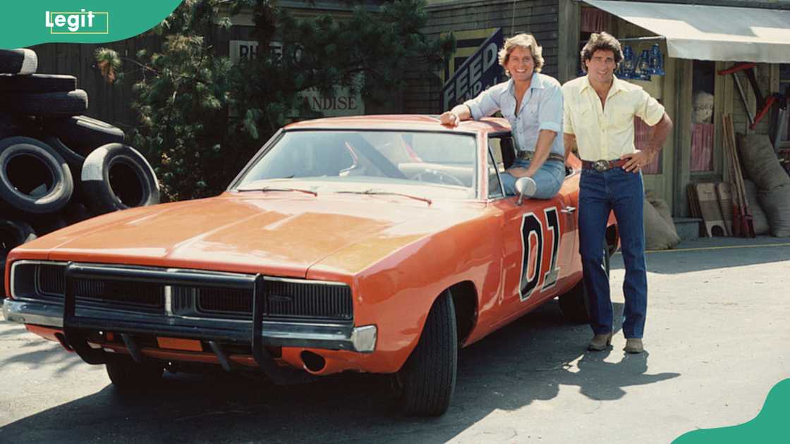 American actor Byron Cherry (as Coy Duke) and Christopher Mayer (as Vance Duke) during the shoot of Dukes of Hazzard in 1982.