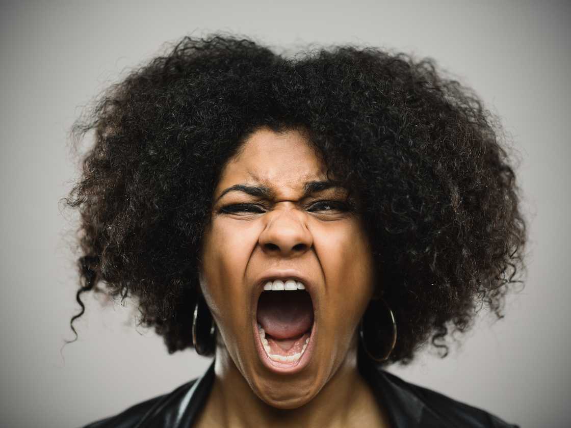 An angry lady is shouting An angry lady is shouting