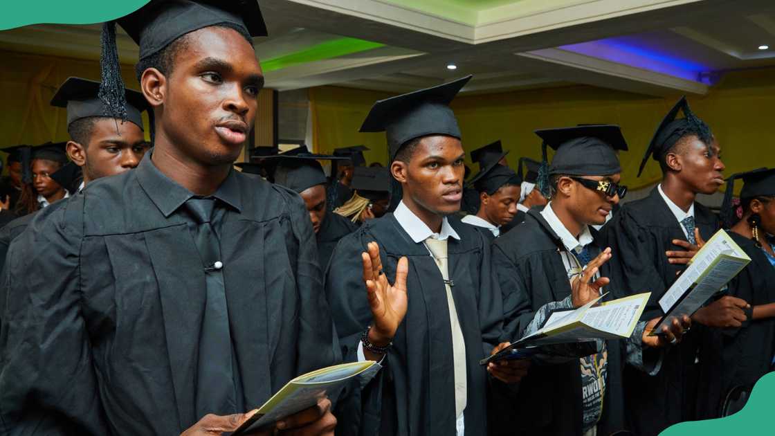 Dominican University students attend a graduation event