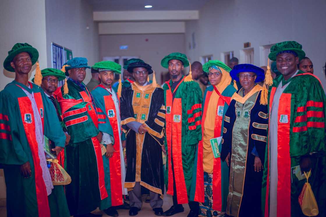 GSU staff pose in academic regalia participating in a graduation or convocation ceremony at a university.